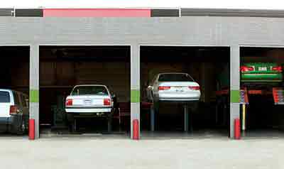 Photo of cars at mechanic in Auto bay